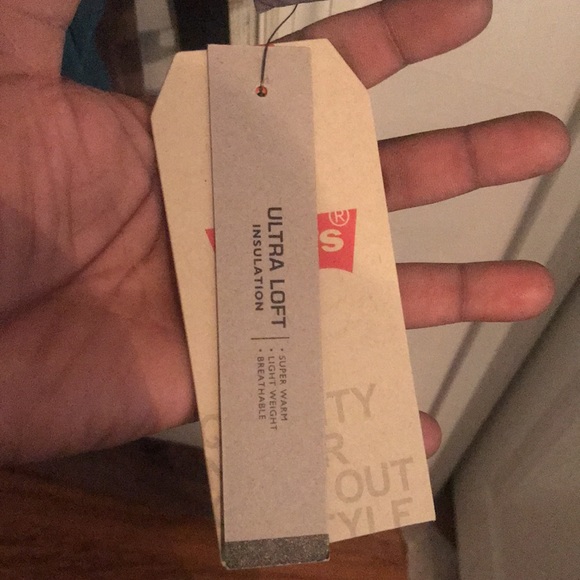 I am selling a Levi’s snow camouflage puffer jacket. New with tag. - Picture 3 of 3